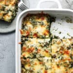 Spinach Fandango recipe is a tasty casserole with beef, cheese, and spinach in a large casserole dish for a hungry crowd.