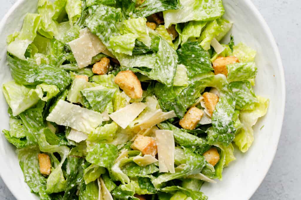 Overhead image of a bowl of Caesar Salad