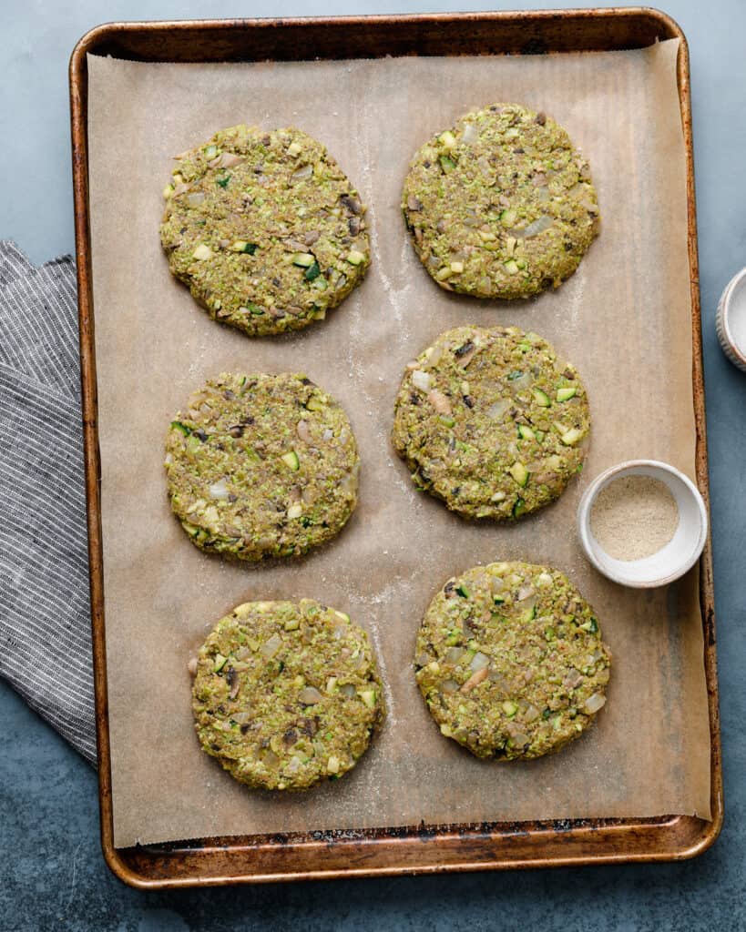 a sheet pan of veggie burgers before heading to the oven