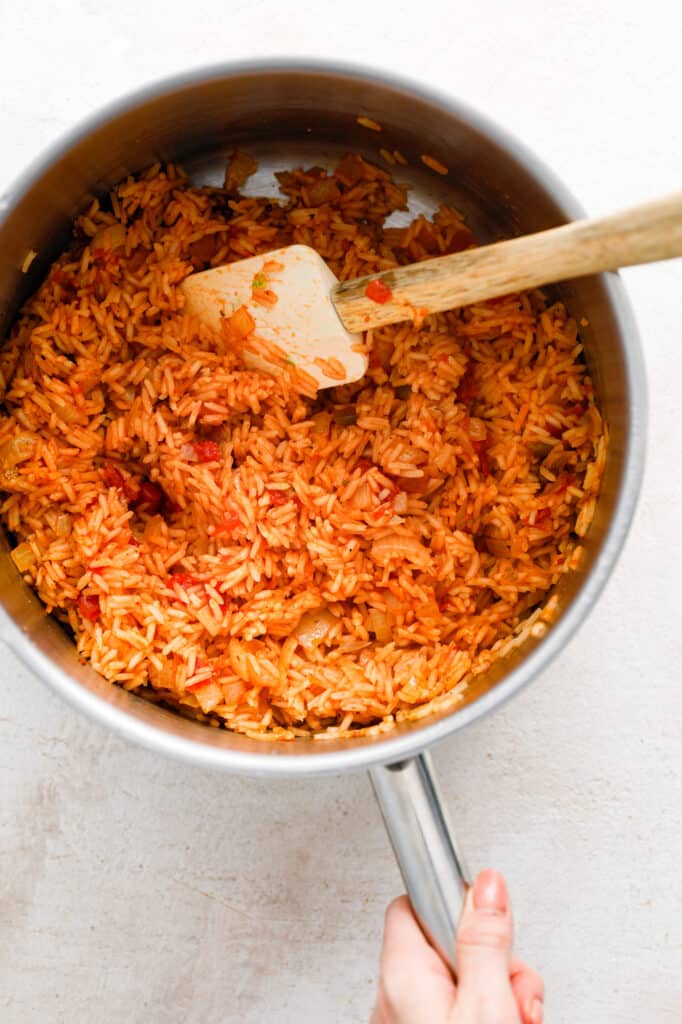 once the rice is cooked it will soak up all of the liquid, leaving you with cooked rice