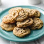 fresh baked classic chocolate chip cookies on a blue plate