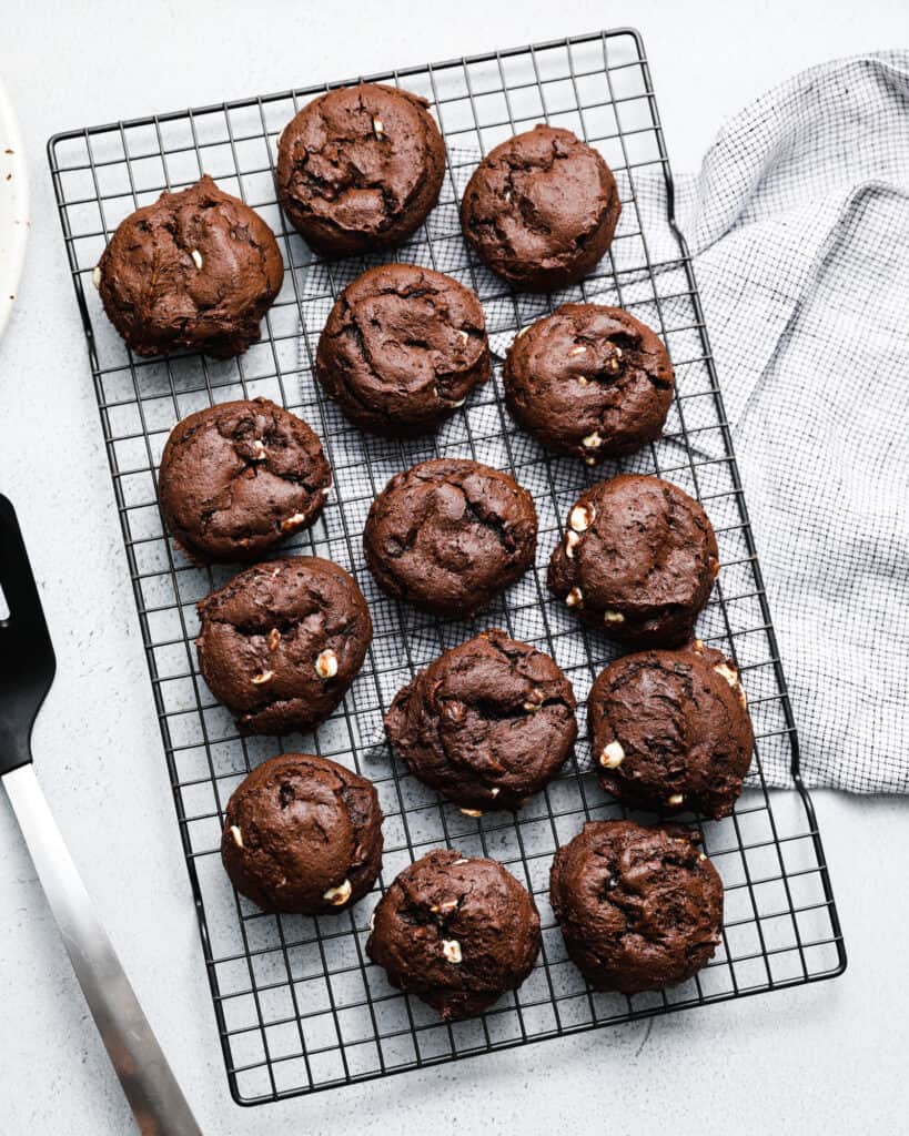 Chocolate Cookies on a cooling rack with a blue napkin