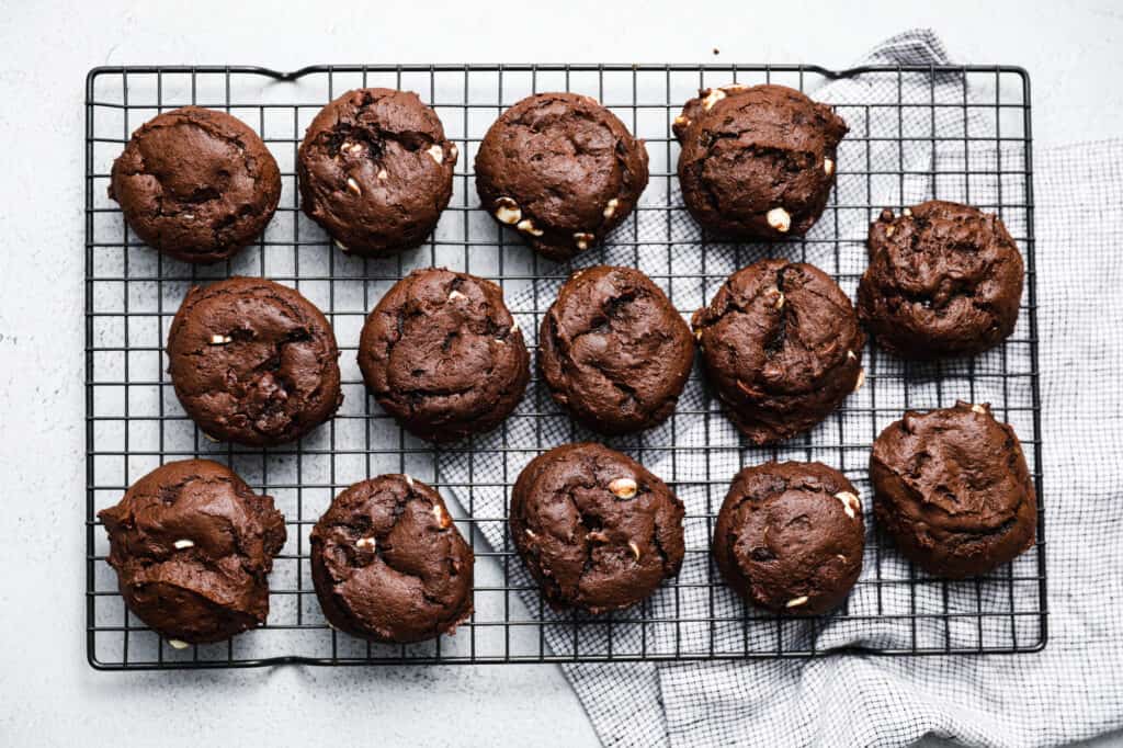 Chewy Chocolate Chocolate Chip Cookies on a wire rack cooling