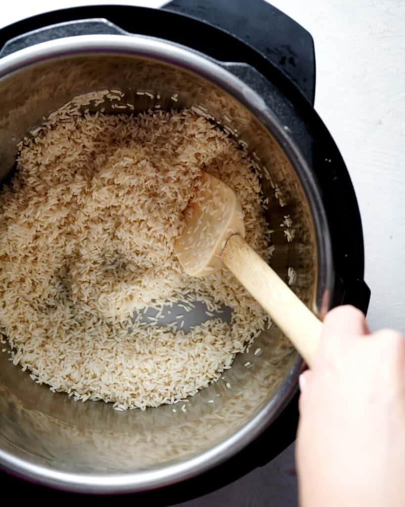 Rice in an instant pot being toasted