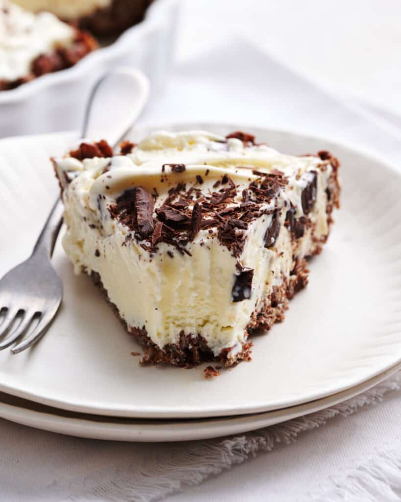 A slice of ice cream pie with a bite taken out