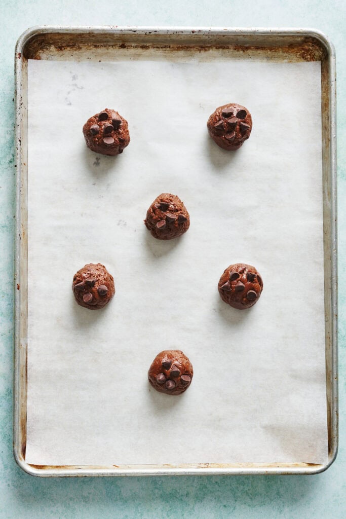 dough balls on a cookie sheet