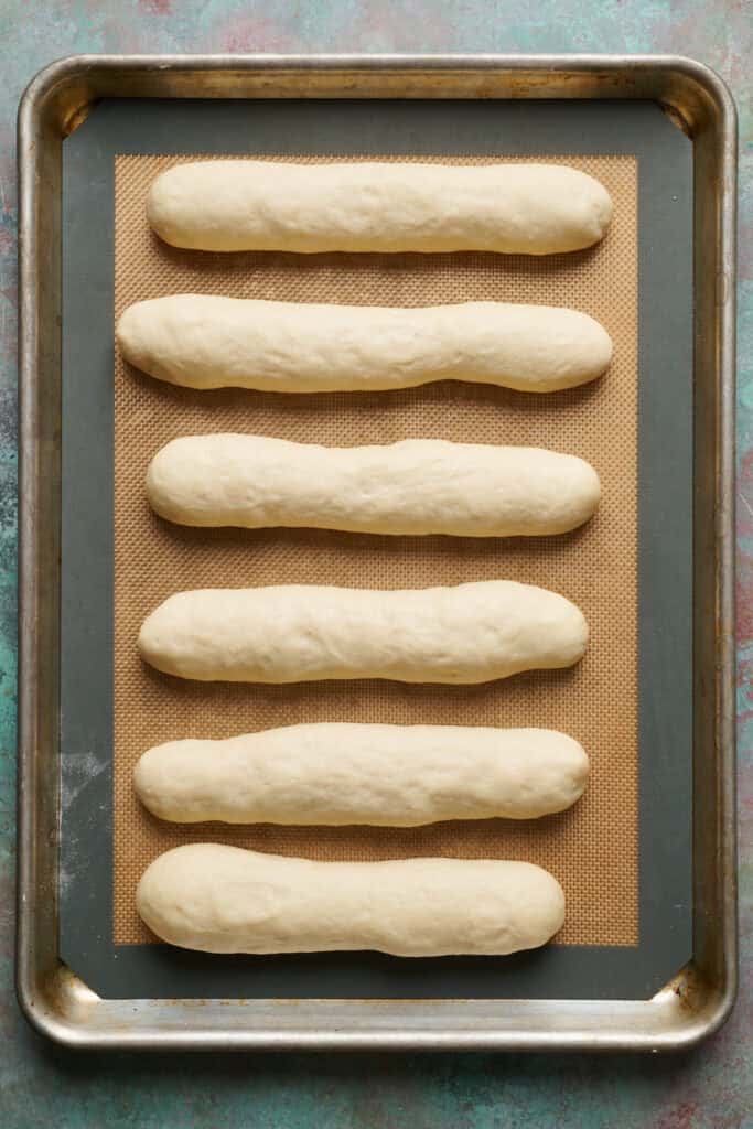 breadsticks after the second rise on a sheet pan