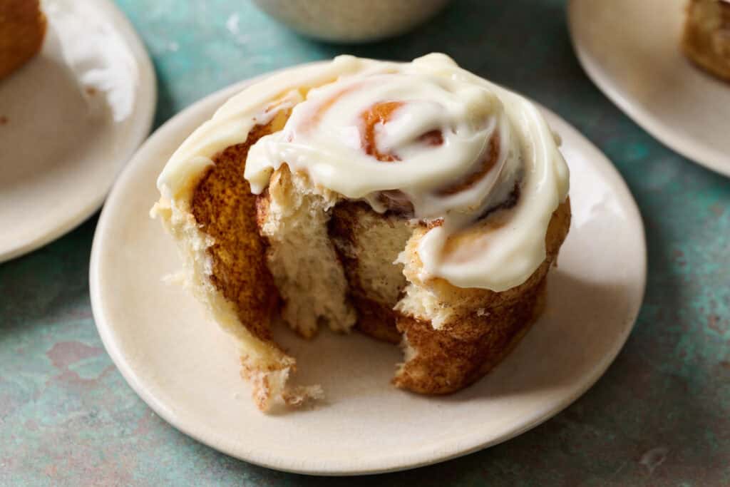 Side view of a cinnamon roll that's been cut into