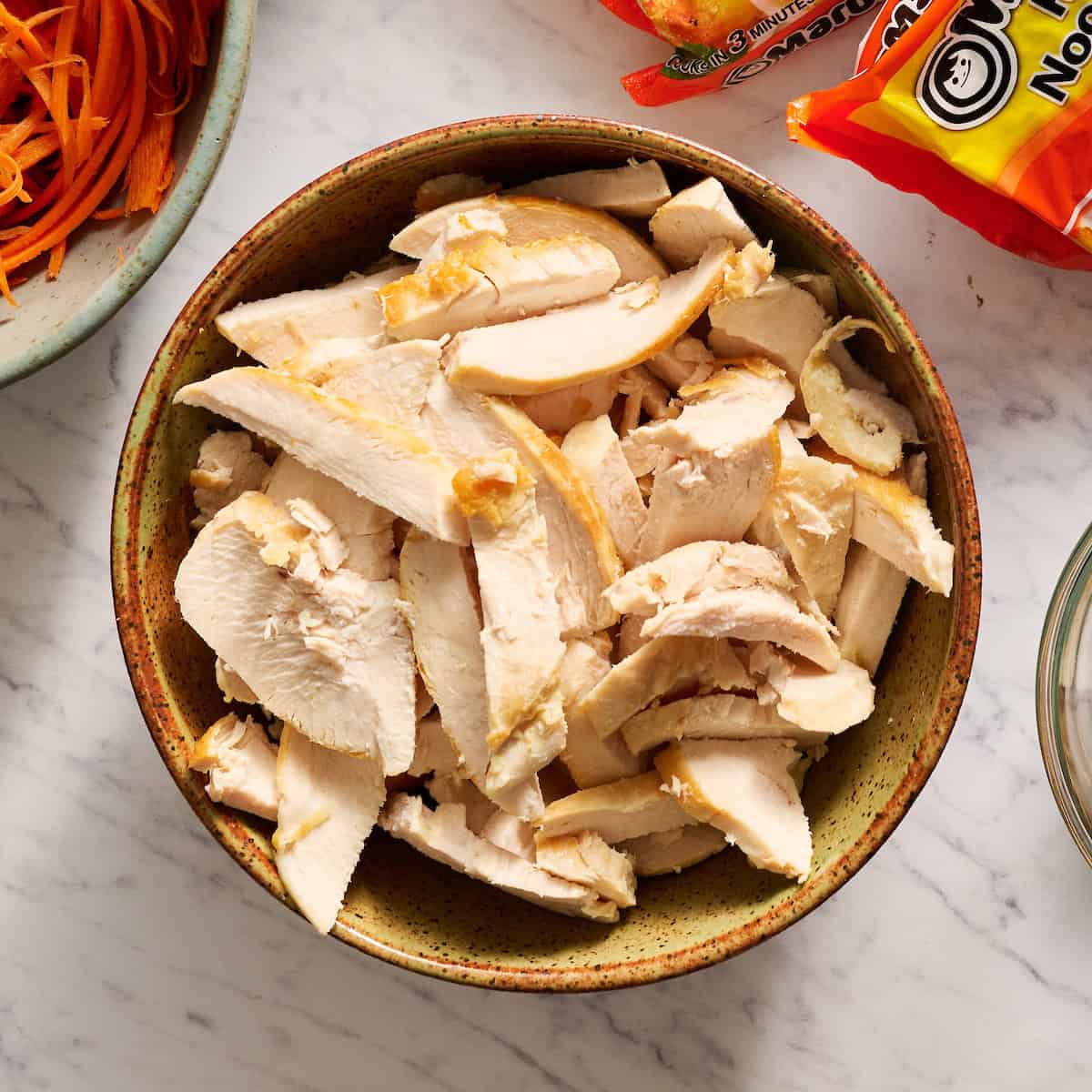 sliced chicken breast in a bowl