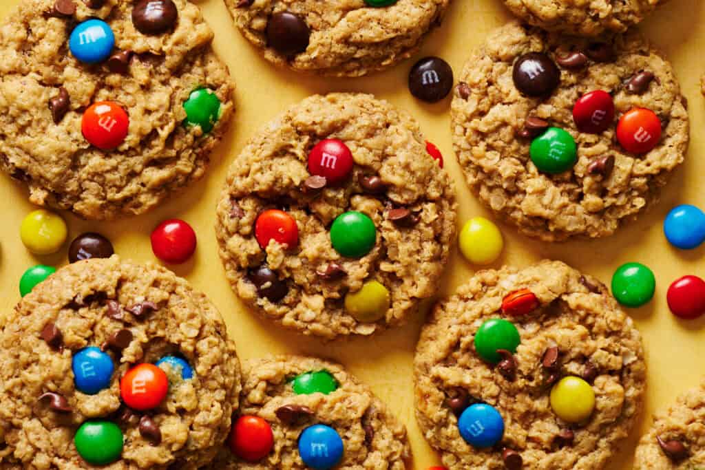 overhead view of monster cookies made with peanut butter, oatmeal, chocolate chips and M&Ms candies
