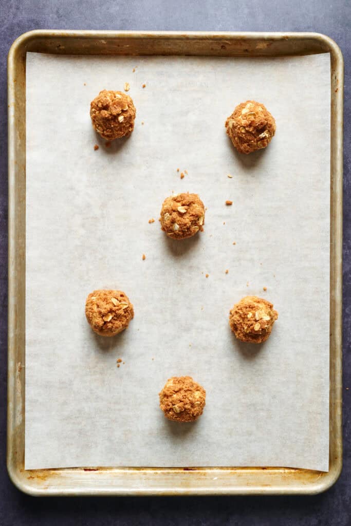 scooped dough balls on a cookie sheet