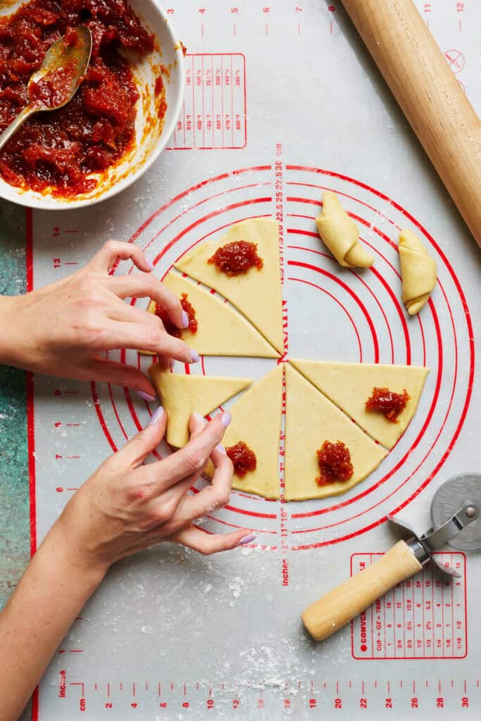 rolling kifle cookies with apricot filling