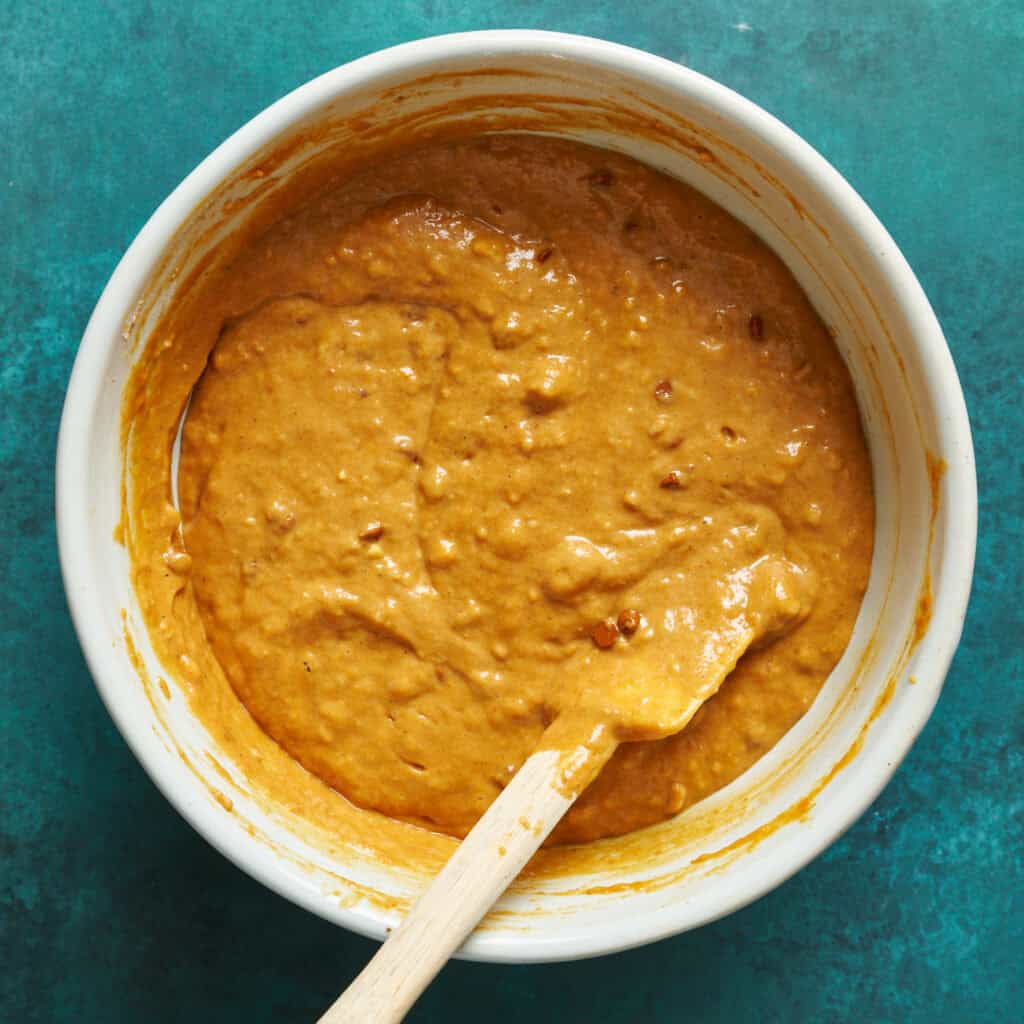 batter in a bowl ready to portion out into a muffin tin