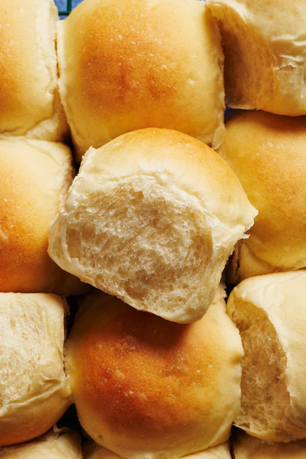 overhead view of a stack of sourdough discard dinner rolls