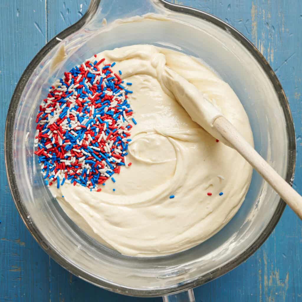 cake batter with red white and blue sprinkles