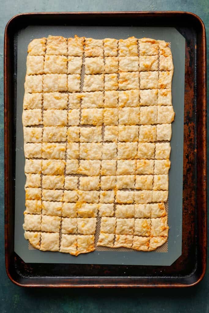 fully baked crackers from the oven on a sheet tray