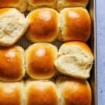 overhead view of a pan of discard dinner rolls.