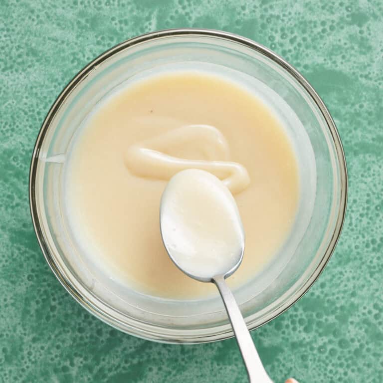 frosting base in a heatproof bowl