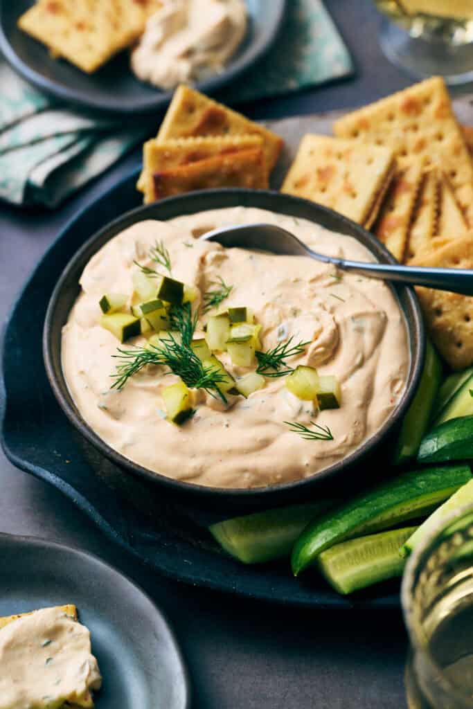 side view of a bowl filled with dill pickle dip