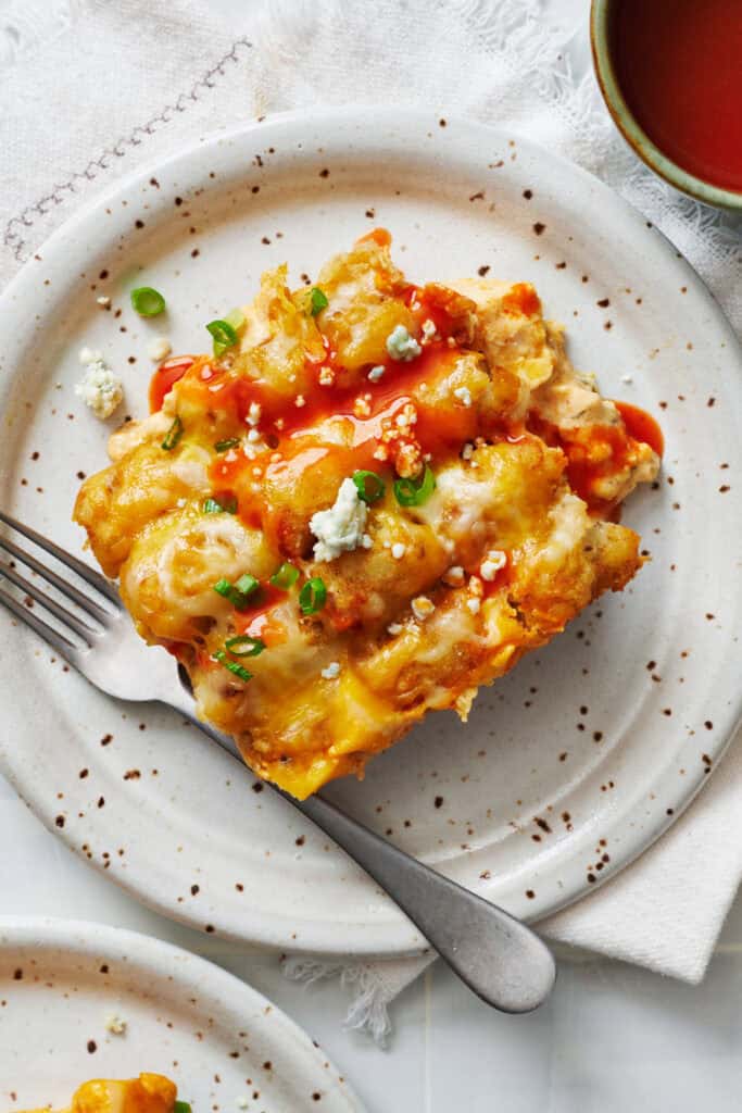 A slice of tater tot casserole on a plate