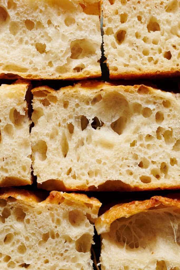 closeup view of the interior of a focaccia bread slice