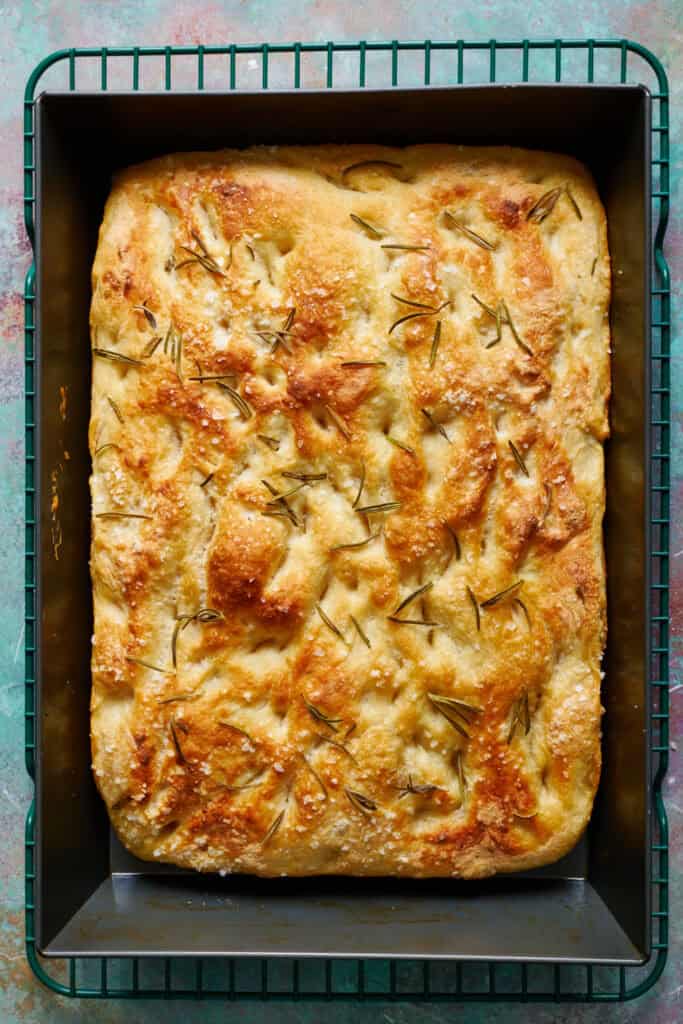 sourdough discard focaccia bread fresh out of the oven and golden brown on top