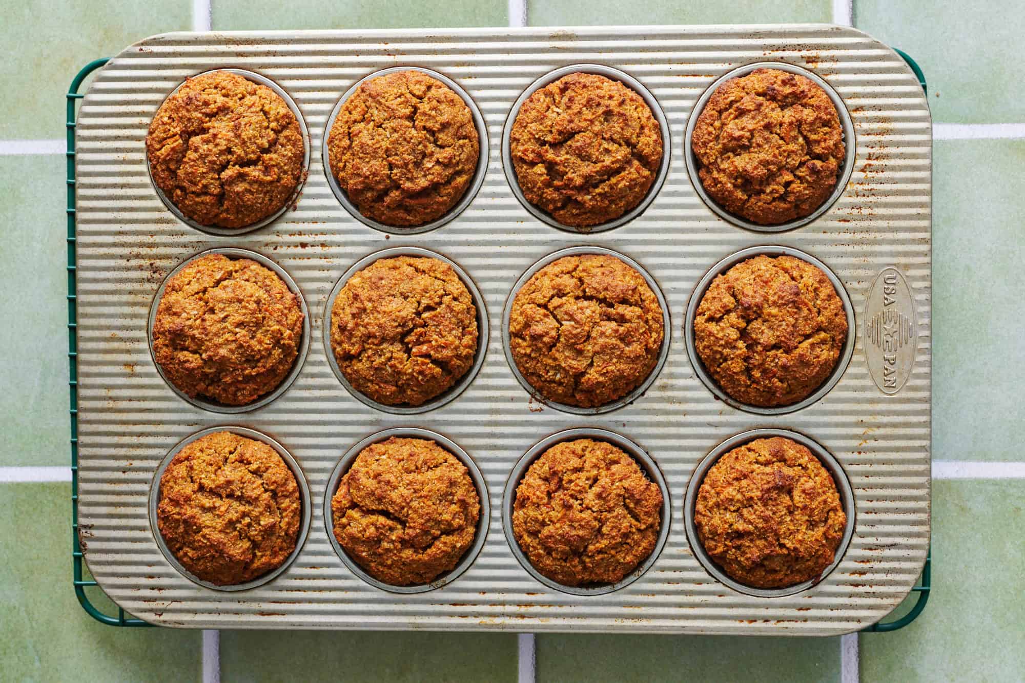 healthy carrot cake cupcakes out of the oven after being baked