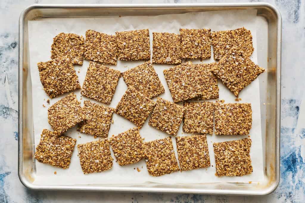 the crackers after being baked and broken up on a sheet pan