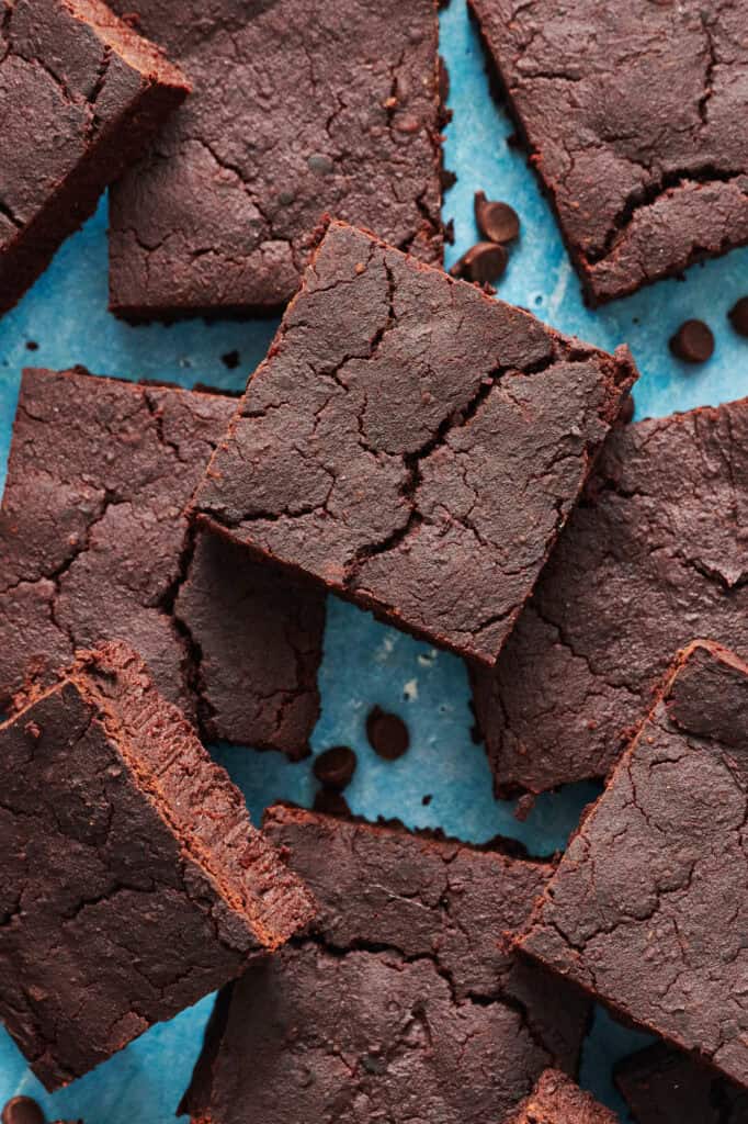 gluten free sugar free brownies overhead on a blue surface