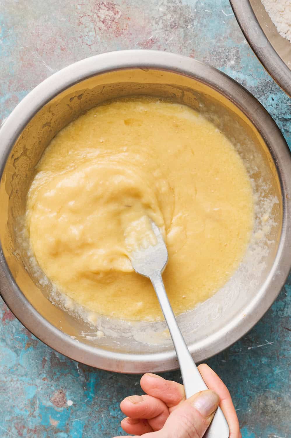 wet ingredients combined in a metal bowl