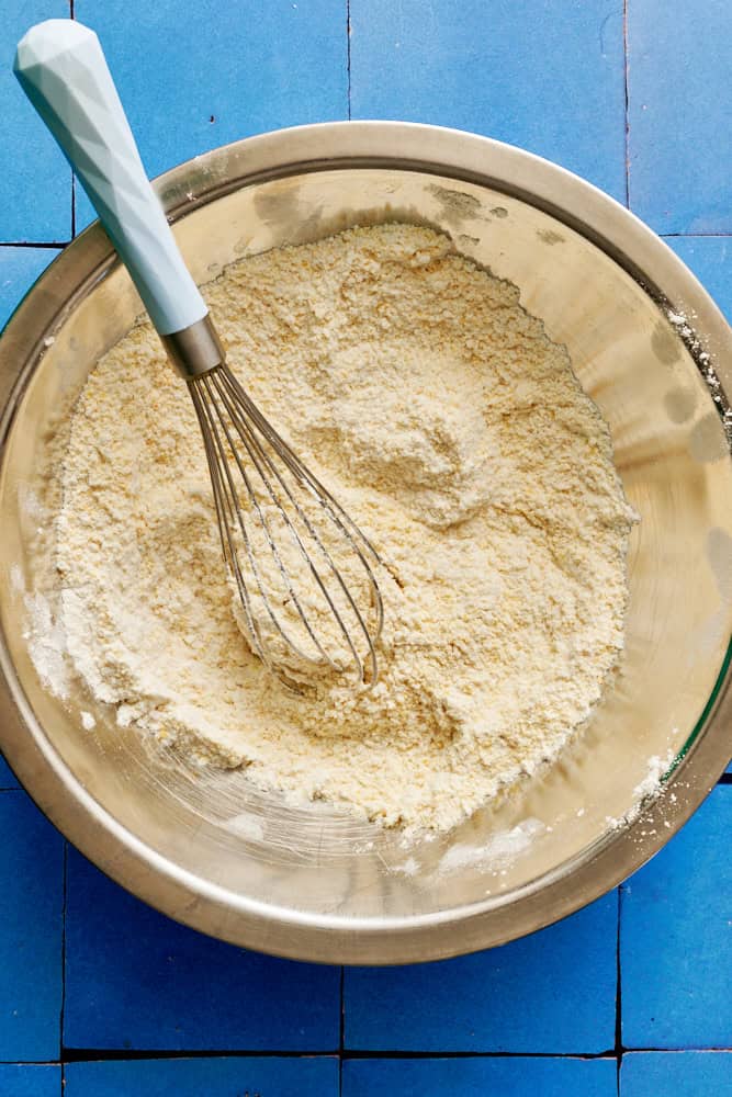 the dry ingredients in a bowl with a whisk