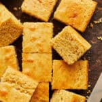 sliced sourdough discard cornbread on a cutting board