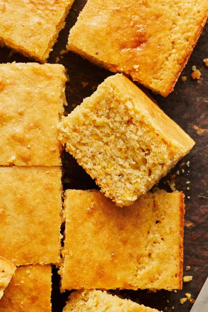 sliced sourdough discard cornbread on a cutting board