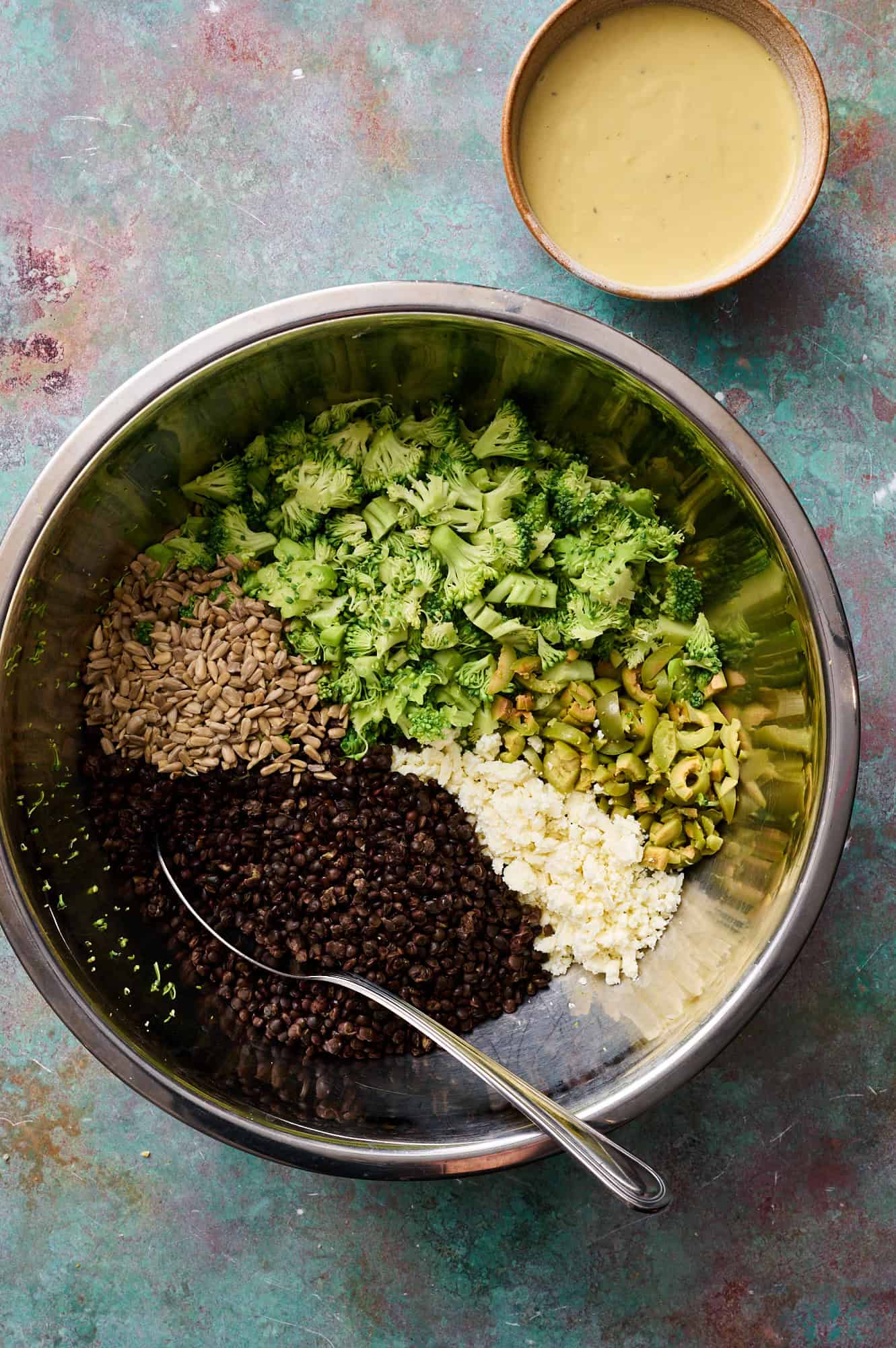 components of the salad in a large bowl ready to be mixed