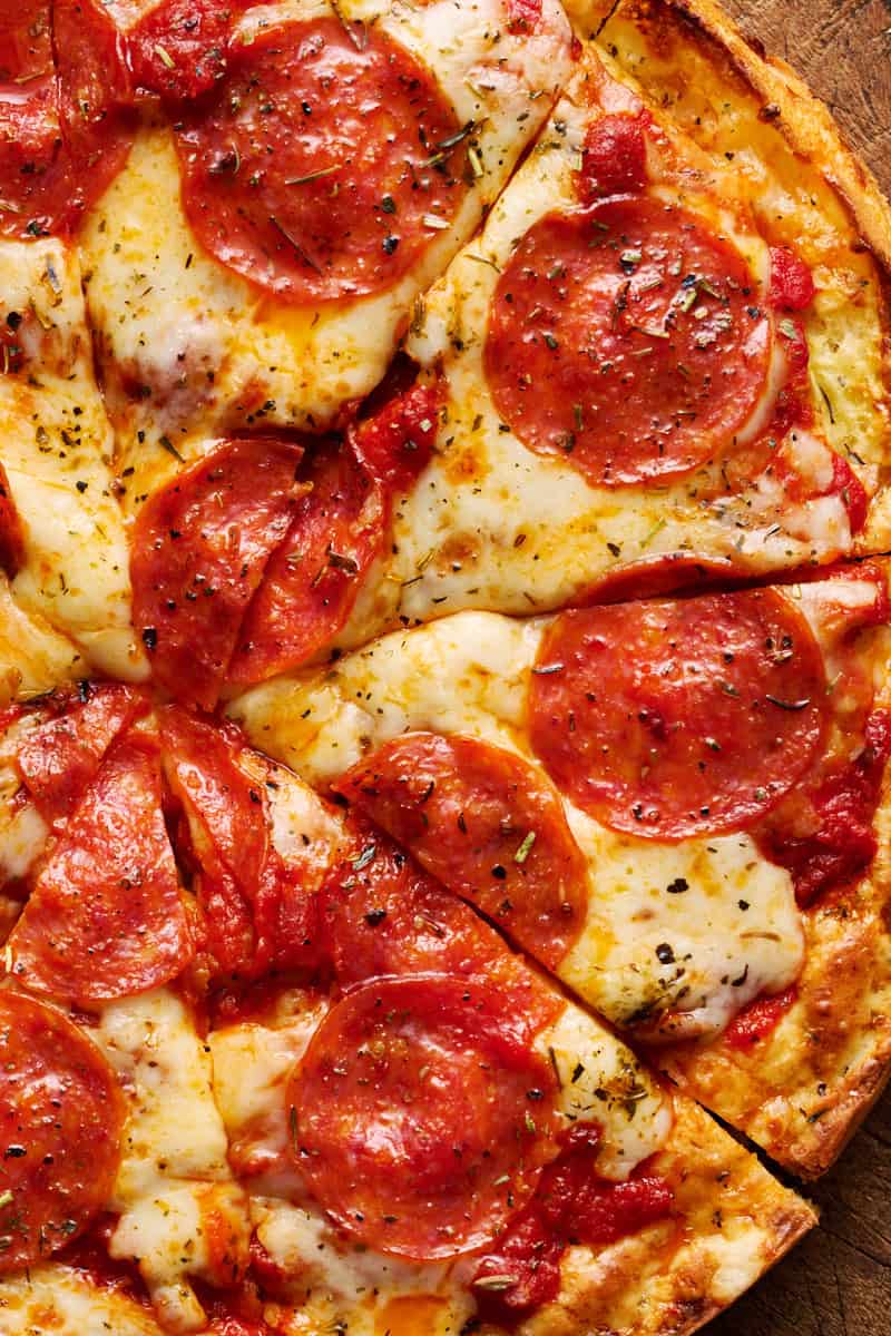 closeup photo of cottage cheese crust pizza with cheese and pepperoni