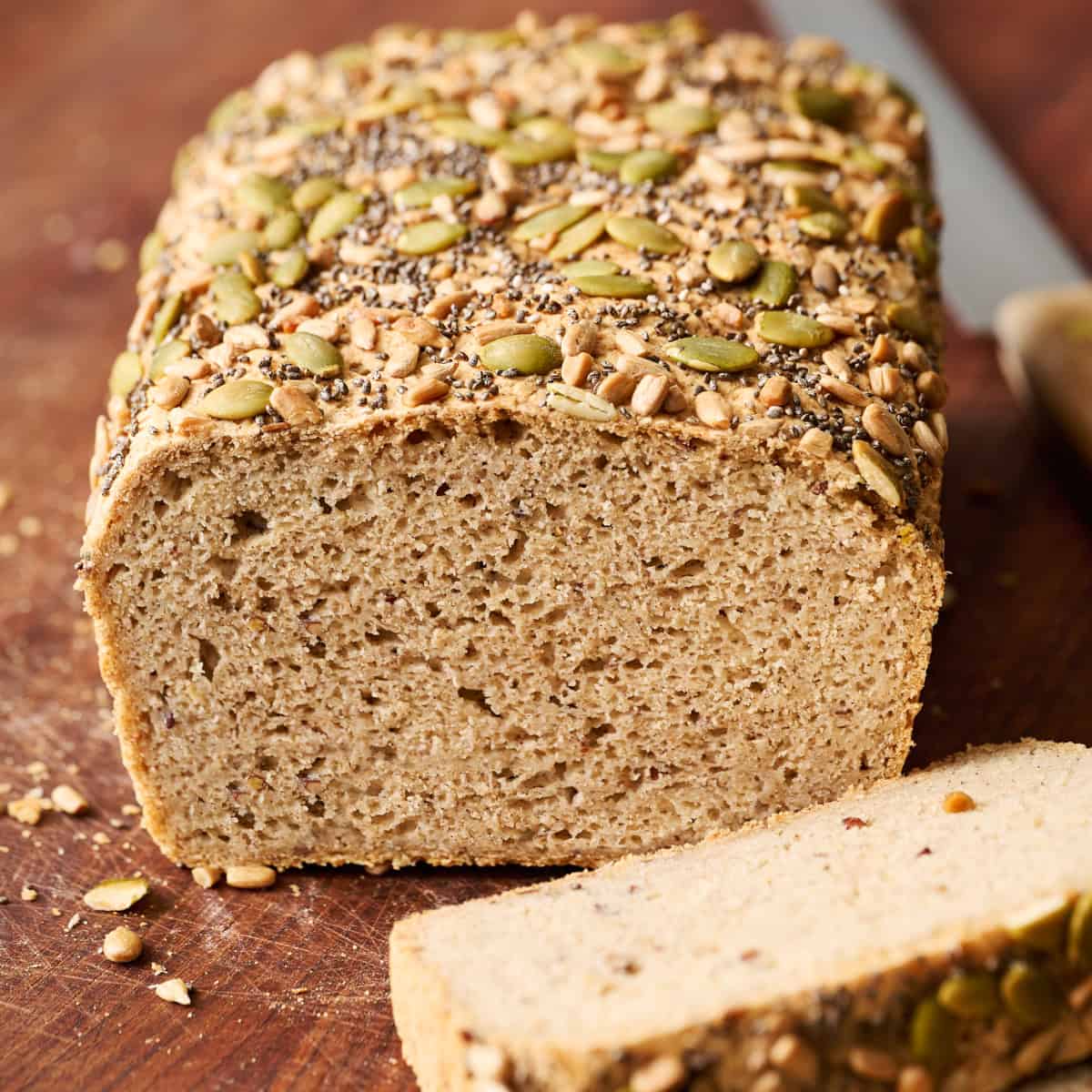 a loaf of bread with two slices removed to see interior of the loaf