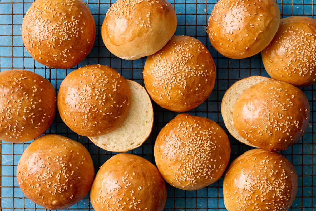 overhead of hamburger buns on a cooling rack