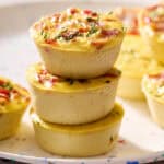 egg bites stacked on a plate