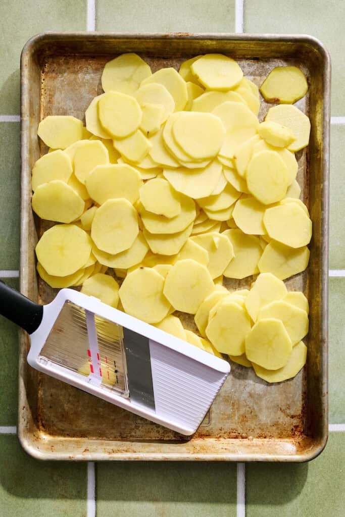 slicing potatoes with a mandonline