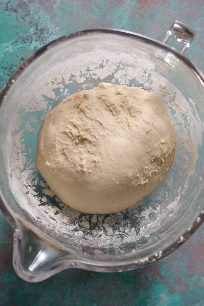 sourdough dough ball in a large mixing bowl before build fermentation