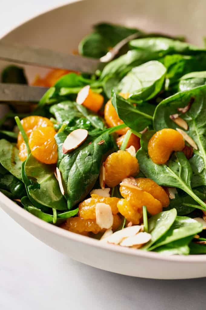 closeup of mandarin orange spinach salad