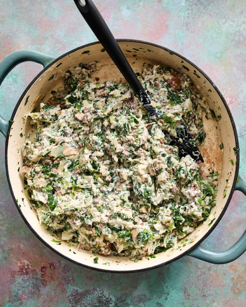 add the creamy mixture with mushroom soup and sour cream to the pot