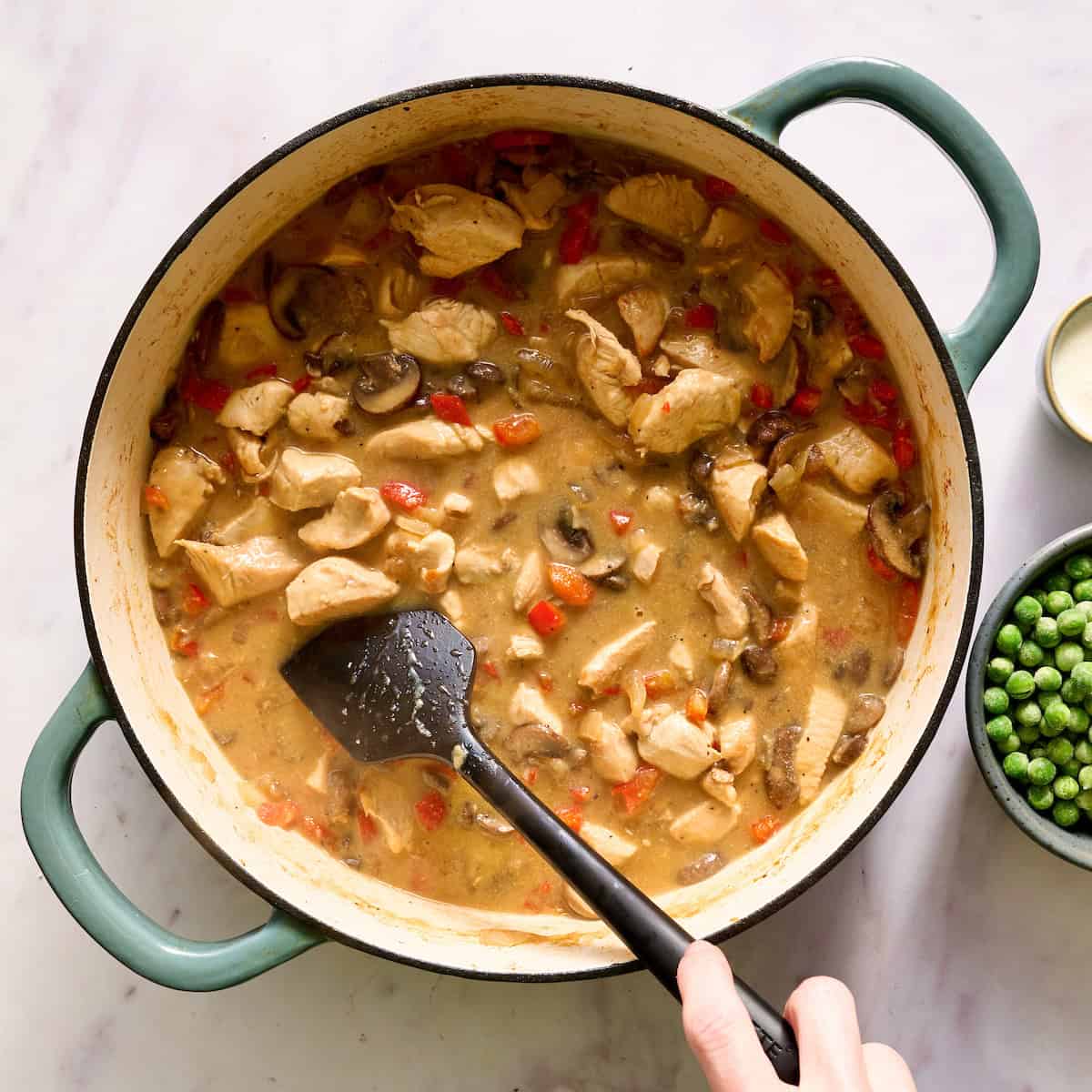 stirring broth into chicken a la king