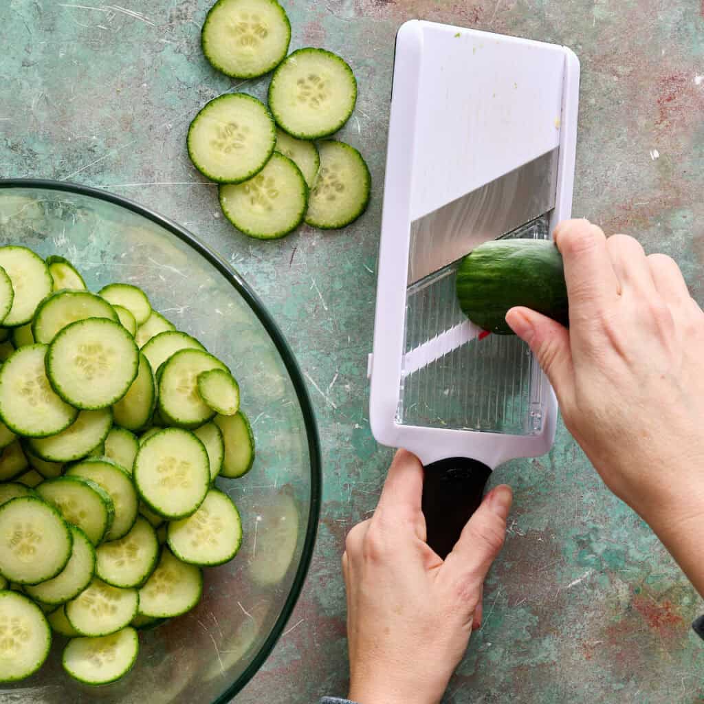 slicing cucumbers with a mandoline