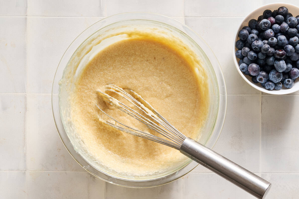 whisking in the sourdough discard to the wet ingredients