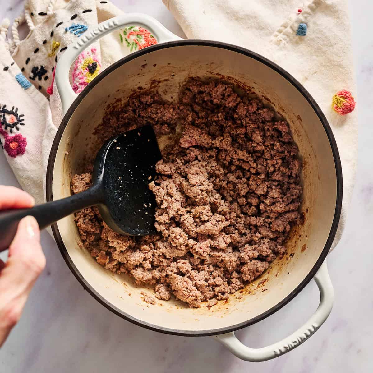 cooking ground beef in a pot