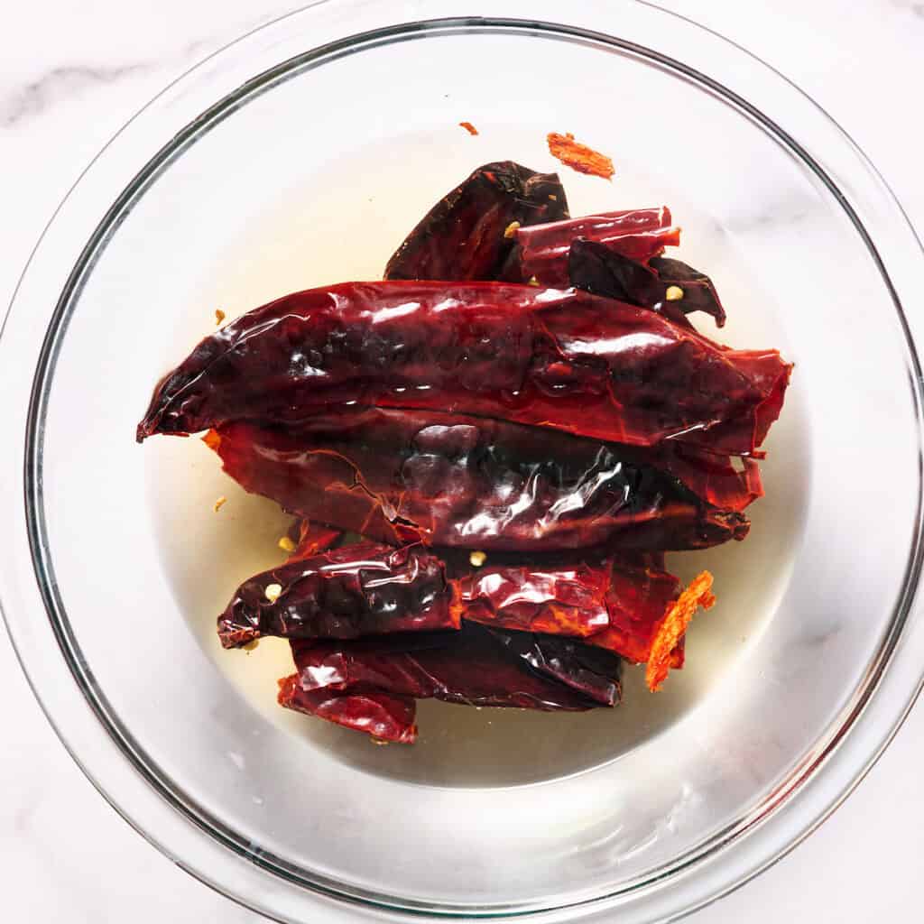 chili pods steeping in hot water