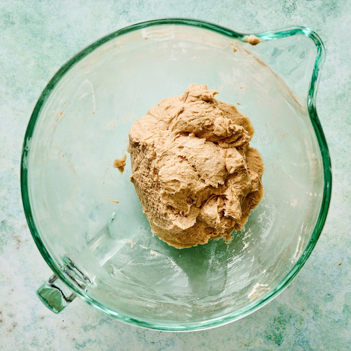forming a dough ball in a mixing bowl